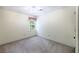 Carpeted bedroom with a window, ceiling fan, and neutral walls at 3625 Stonehenge Ne Way, Marietta, GA 30066