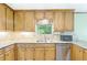 Kitchen featuring stainless steel appliances, granite countertops, and tiled backsplash at 3625 Stonehenge Ne Way, Marietta, GA 30066