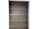 Walk-in closet with multiple shelves at 401 Courtyard Ter, Woodstock, GA 30189