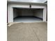 Spacious two-car garage with painted flooring at 401 Courtyard Ter, Woodstock, GA 30189