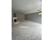 Spacious living room with a fireplace and carpet floors at 401 Courtyard Ter, Woodstock, GA 30189