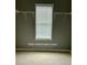 Walk-in closet with window at 401 Courtyard Ter, Woodstock, GA 30189