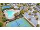 Aerial view of community with pool, tennis courts, clubhouse, and parking at 5365 Radford Loop, Fairburn, GA 30213
