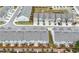 Aerial view of community with pool, tennis courts, clubhouse, and parking at 5365 Radford Loop, Fairburn, GA 30213
