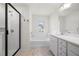 Bathroom featuring a soaking tub and glass enclosed shower at 5365 Radford Loop, Fairburn, GA 30213