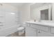 Bathroom with a shower and tub combination, and a single sink vanity with white cabinets at 5365 Radford Loop, Fairburn, GA 30213