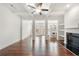 Inviting living space boasts coffered ceilings, hardwood floors, and an open layout at 5365 Radford Loop, Fairburn, GA 30213
