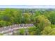 Aerial view of residential homes nestled among lush green trees at 8555 Hope Mews Ct, Sandy Springs, GA 30350