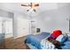Bedroom featuring a cozy bed and access to the ensuite bathroom and closet at 8555 Hope Mews Ct, Sandy Springs, GA 30350