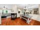 Bright dining area with fireplace, hardwood floors, and elegant chandelier at 8555 Hope Mews Ct, Sandy Springs, GA 30350