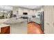 Stylish kitchen featuring granite countertops, stainless steel appliances, and ample cabinetry at 8555 Hope Mews Ct, Sandy Springs, GA 30350
