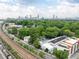 A beautiful aerial view showcasing the surrounding neighborhood and nearby highway at 964 Dekalb Ne Ave # 112, Atlanta, GA 30307