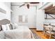 Bright bedroom features a cozy bed, hardwood floors, and a charming desk area with ample light at 964 Dekalb Ne Ave # 112, Atlanta, GA 30307