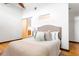 Bedroom features an en-suite and hardwood floors, creating a relaxing retreat with natural light at 964 Dekalb Ne Ave # 112, Atlanta, GA 30307