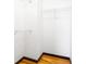 Walk in closet with wire rack shelving and hardwood floors at 964 Dekalb Ne Ave # 112, Atlanta, GA 30307