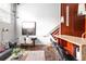 Comfortable living room with a leather sofa, chic decor, and lots of natural light at 964 Dekalb Ne Ave # 112, Atlanta, GA 30307