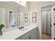 Bathroom features long countertop, cabinets, and view of the connected bedroom at 1014 Seaboard Nw Ave, Atlanta, GA 30318