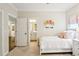 Bright bedroom with charming decor, including a unicorn wall hanging and pink-striped roman shade at 1014 Seaboard Nw Ave, Atlanta, GA 30318