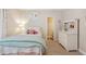 Charming bedroom with neutral walls, white trim, and a comfortable bed at 1014 Seaboard Nw Ave, Atlanta, GA 30318