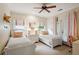 Cozy bedroom with two twin beds, neutral walls, and bright accents at 1014 Seaboard Nw Ave, Atlanta, GA 30318
