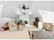 Spacious bonus room with vaulted ceilings, complemented by comfortable seating and a play area at 1014 Seaboard Nw Ave, Atlanta, GA 30318