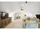 Spacious bonus room featuring vaulted ceilings, ceiling fan and a flexible layout for entertaining or relaxing at 1014 Seaboard Nw Ave, Atlanta, GA 30318