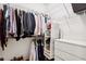 Organized walk-in closet with shelving and storage drawers at 1014 Seaboard Nw Ave, Atlanta, GA 30318
