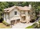 Rear exterior view featuring an attached two car garage and a private side porch area at 1014 Seaboard Nw Ave, Atlanta, GA 30318