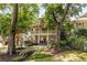 Two-story traditional home with double porches, beautiful landscaping, and a welcoming entrance at 1014 Seaboard Nw Ave, Atlanta, GA 30318