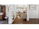 Elegant foyer features hardwood floors, white wainscoting and an open floor plan at 1014 Seaboard Nw Ave, Atlanta, GA 30318