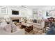 Spacious living room with fireplace, built-ins, and lots of comfortable seating at 1014 Seaboard Nw Ave, Atlanta, GA 30318