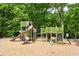 Community playground with slides, climbing structures, and ample space for to play, all set against a backdrop of lush trees at 1014 Seaboard Nw Ave, Atlanta, GA 30318