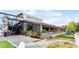 Chattahoochee Food Works exterior showcasing a vibrant, artistic design, outdoor seating, and lush landscaping at 1014 Seaboard Nw Ave, Atlanta, GA 30318