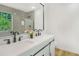 Bathroom featuring a double vanity with granite countertop, modern sinks, and a large mirror at 102 Aristocratic Way, Locust Grove, GA 30248