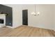 Spacious dining area with hardwood floors and stylish lighting at 102 Aristocratic Way, Locust Grove, GA 30248