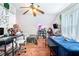 Versatile bedroom with two beds, desk space, and ample natural light at 1211 Fly Rod Ln, Loganville, GA 30052