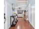 Inviting foyer with hardwood floors and a view of the living room and staircase at 1211 Fly Rod Ln, Loganville, GA 30052