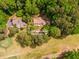 Aerial view of home and golf course. Located at 2228 Walker Drive, Lawrenceville, GA at 2228 Walker Dr, Lawrenceville, GA 30043