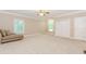 Spacious bedroom features neutral decor, carpet flooring, and a ceiling fan for optimal comfort at 2228 Walker Dr, Lawrenceville, GA 30043