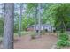 A single-story brick home with a neatly landscaped yard and stone accents at 2279 Parkview Cir, College Park, GA 30337