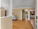 Inviting foyer with hardwood floors seamlessly leading to the living and dining areas at 2279 Parkview Cir, College Park, GA 30337