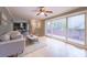 Open-concept living room featuring hardwood floors, lots of light, and modern furnishings at 2279 Parkview Cir, College Park, GA 30337