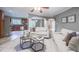 Inviting living room with a neutral color palette, open to the kitchen, and a comfortable seating arrangement at 2279 Parkview Cir, College Park, GA 30337