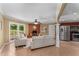Open floor plan living room and kitchen with a fireplace and access to the outdoors at 2279 Parkview Cir, College Park, GA 30337