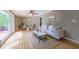 Bright living room with hardwood floors, large windows, and comfortable seating at 2279 Parkview Cir, College Park, GA 30337