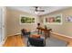 Home office with hardwood floors, natural light, and a stylish black and wood color scheme at 2279 Parkview Cir, College Park, GA 30337