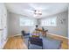 Bright office with hardwood floors, ceiling fan, a desk, seating, and natural light at 2279 Parkview Cir, College Park, GA 30337