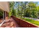 Brick patio with views of green grass and trees at 2279 Parkview Cir, College Park, GA 30337