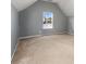 Bedroom with neutral walls, plush carpet, and lots of natural light at 2738 Lakewater Way, Snellville, GA 30039