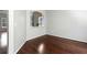 Minimalist room with hardwood floors, neutral walls, and a cozy niche at 2738 Lakewater Way, Snellville, GA 30039